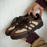 Fashionable Adidas Samba brown suede kicks with cream accents, ideal for creating aesthetic Pinterest boards for men's casual style.