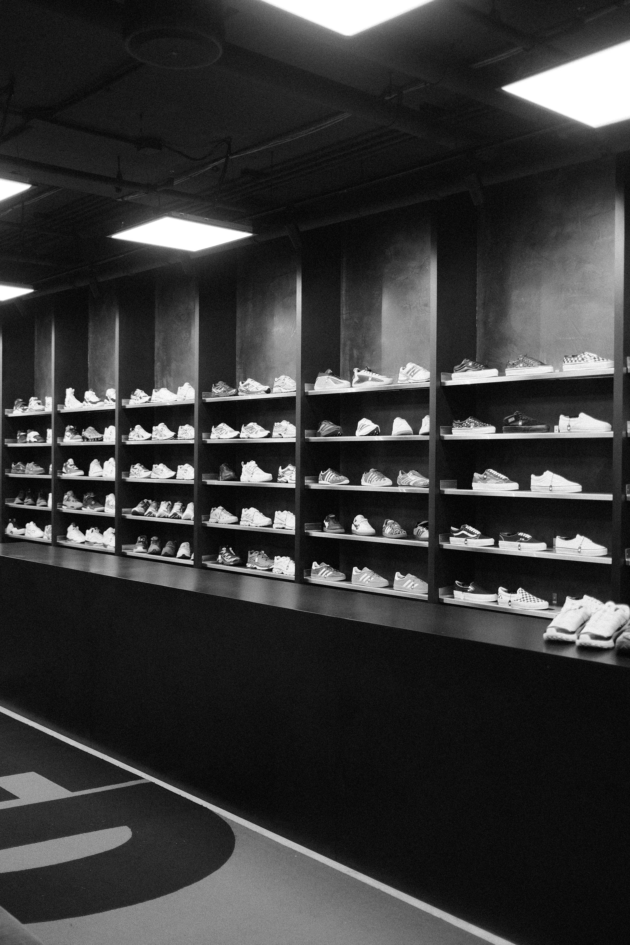 Premium sneaker wall with curated lifestyle footwear at Kickarena